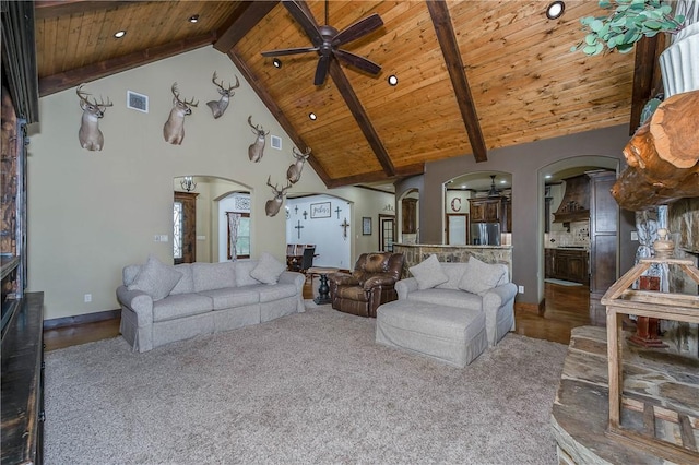 living room featuring arched walkways, high vaulted ceiling, a ceiling fan, wooden ceiling, and visible vents