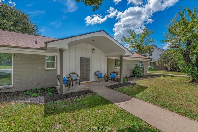 exterior space with a lawn