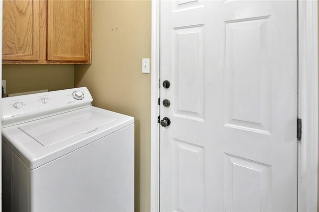 713 Broadmoor Dr, Bryan, TX 77802 - laundry area with washer / dryer and cabinet space