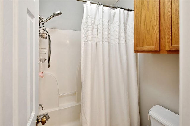 713 Broadmoor Dr, Bryan, TX 77802 - bathroom featuring toilet and shower / bath combo