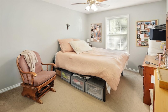 713 Broadmoor Dr, Bryan, TX 77802 - bedroom with light colored carpet, baseboards, and a ceiling fan
