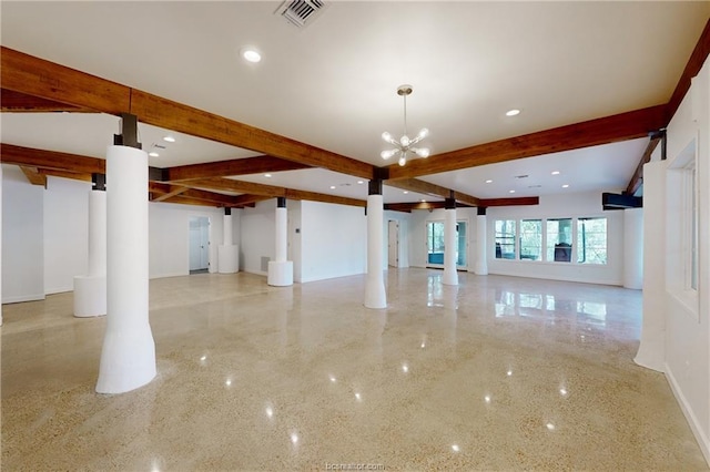 unfurnished living room featuring beam ceiling, an inviting chandelier, and ornate columns