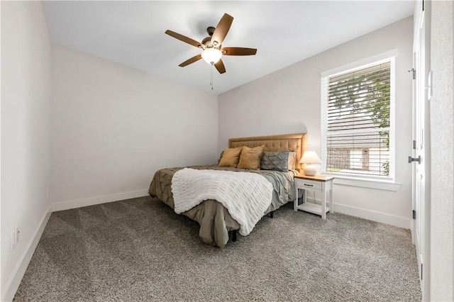 10146 Henley Cv, Iola, TX 77861 - carpeted bedroom with multiple windows, baseboards, and ceiling fan