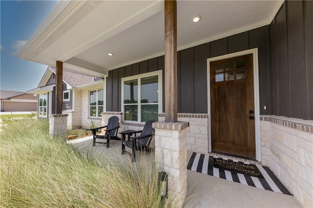 10146 Henley Cv, Iola, TX 77861 - doorway to property featuring board and batten siding and a porch