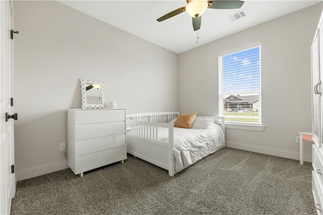 10146 Henley Cv, Iola, TX 77861 - bedroom with carpet floors, baseboards, and ceiling fan
