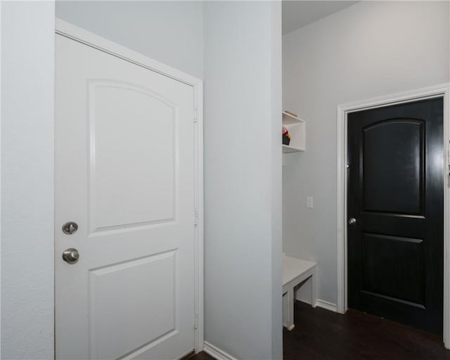 122 Dove Ct, Navasota, TX 77868 - mudroom featuring dark wood-style floors and baseboards