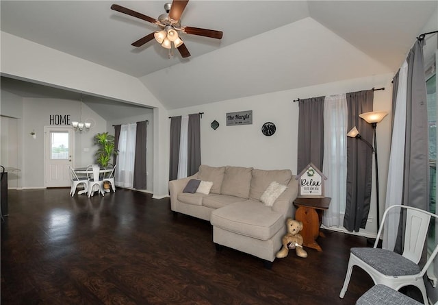 122 Dove Ct, Navasota, TX 77868 - living area with vaulted ceiling, a chandelier, a ceiling fan, and wood finished floors