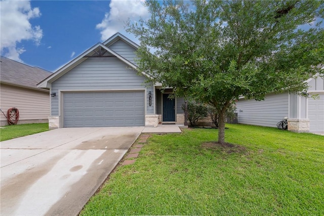 122 Dove Ct, Navasota, TX 77868 - view of front facade with concrete driveway, a garage, and a front yard