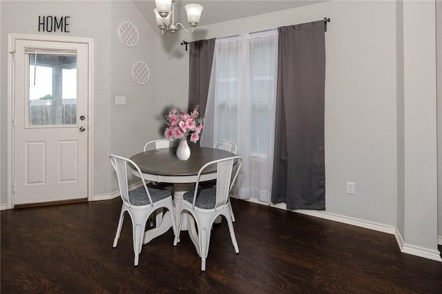 122 Dove Ct, Navasota, TX 77868 - dining space featuring wood finished floors and a chandelier