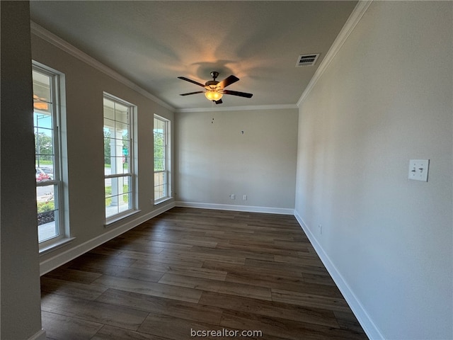 unfurnished room featuring ceiling fan, dark hardwood / wood-style flooring, and crown molding