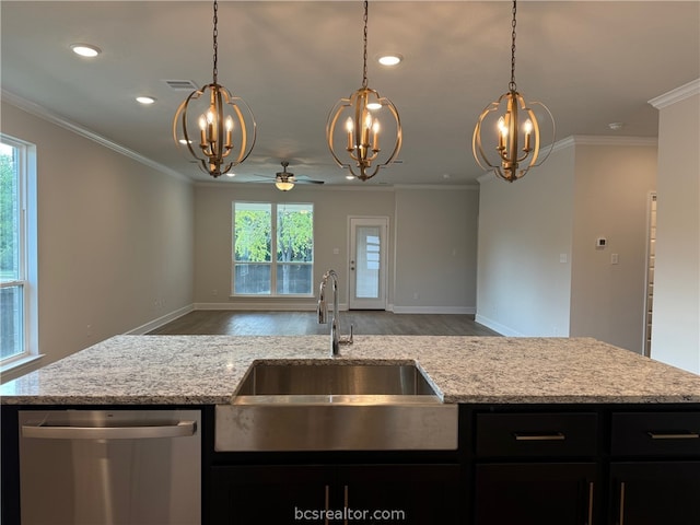 kitchen with ceiling fan, dishwasher, a healthy amount of sunlight, and hardwood / wood-style flooring