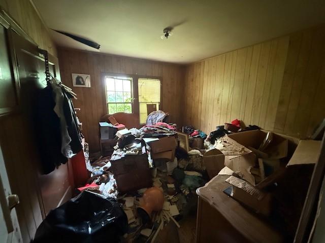 400 S Brazos Ave, Bryan, TX 77803 - misc room featuring wooden walls