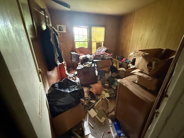 400 S Brazos Ave, Bryan, TX 77803 - misc room with wood walls