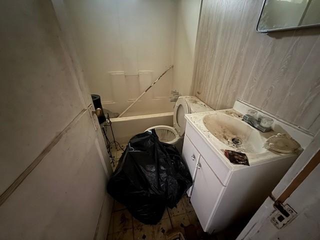 400 S Brazos Ave, Bryan, TX 77803 - bathroom with vanity, toilet, and shower / bathtub combination