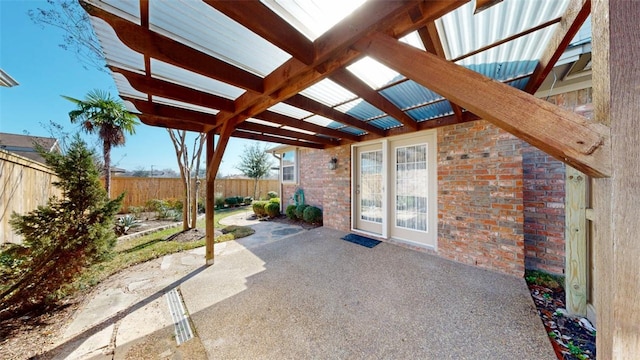 view of patio with a fenced backyard and a pergola