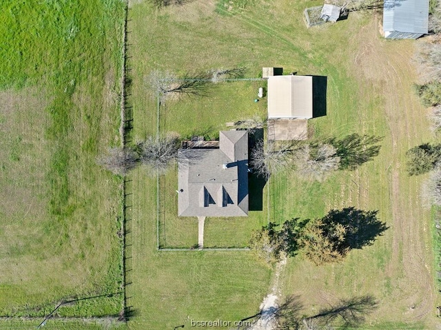 birds eye view of property featuring a rural view