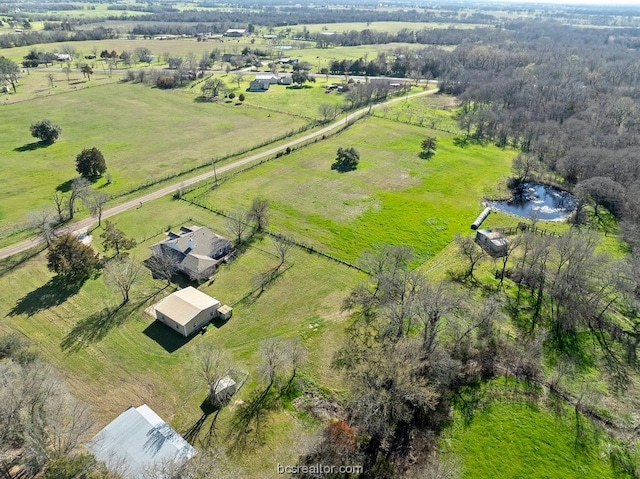 bird's eye view with a rural view and a water view