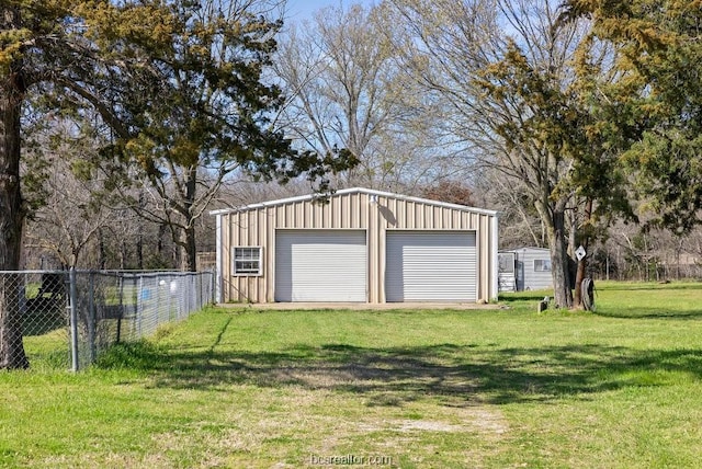 garage with a lawn