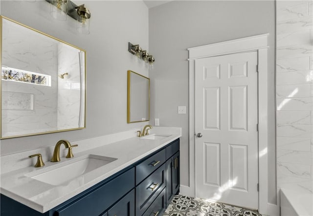 bathroom with vanity and tiled shower / bath combo