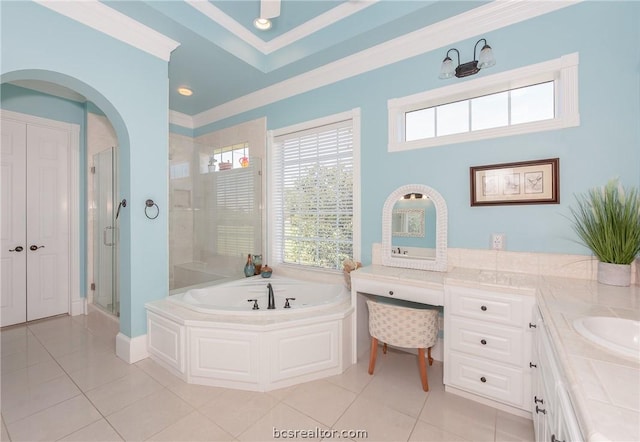 bathroom with tile patterned flooring, vanity, separate shower and tub, and ornamental molding