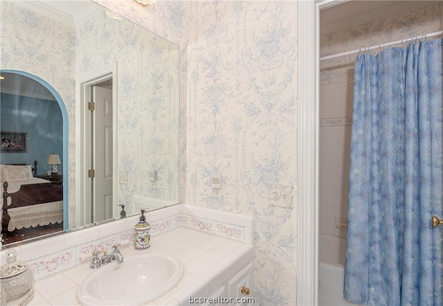 bathroom with vanity and shower / bathtub combination with curtain