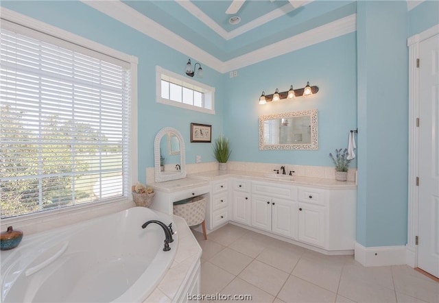 bathroom featuring a garden tub, plenty of natural light, vanity, and tile patterned floors