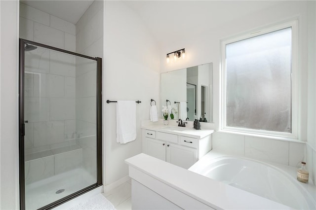 bathroom with vanity and plus walk in shower