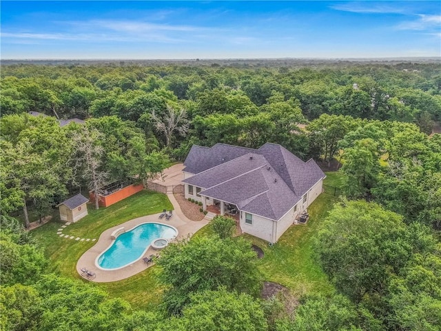3281 Toltec Trl, College Station, TX 77845 - drone / aerial view with a forest view
