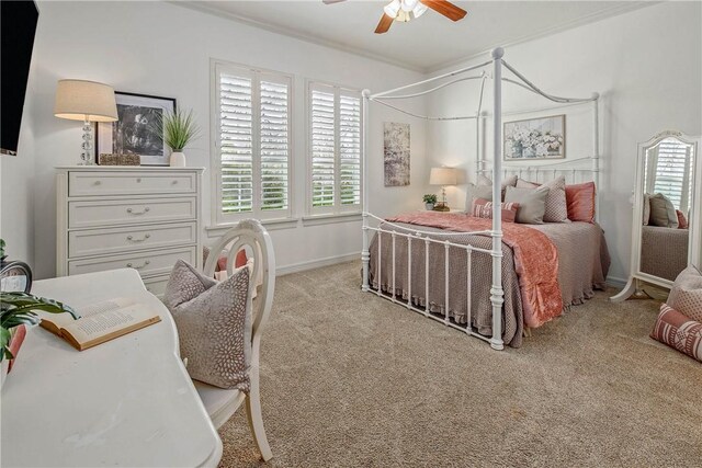 3281 Toltec Trl, College Station, TX 77845 - carpeted bedroom featuring baseboards, ornamental molding, and a ceiling fan