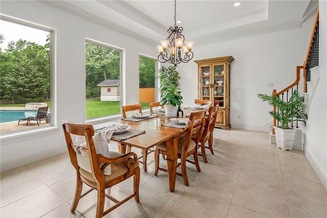 3281 Toltec Trl, College Station, TX 77845 - dining room with light tile patterned flooring, a raised ceiling, stairs, and a chandelier