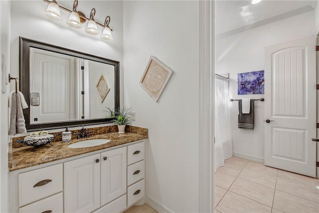 3281 Toltec Trl, College Station, TX 77845 - bathroom featuring vanity, baseboards, and tile patterned flooring