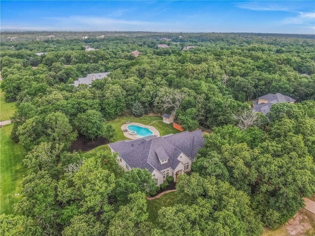 3281 Toltec Trl, College Station, TX 77845 - birds eye view of property with a forest view