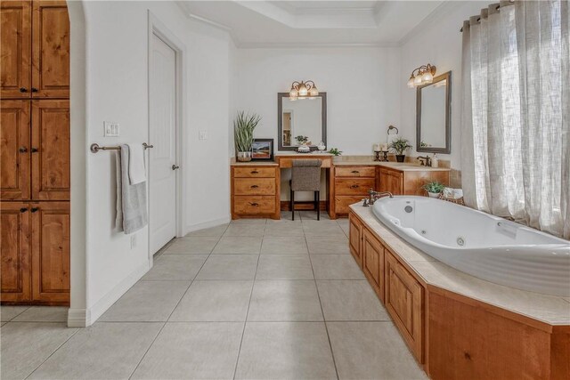 3281 Toltec Trl, College Station, TX 77845 - bathroom featuring a sink, tile patterned floors, crown molding, and a tray ceiling