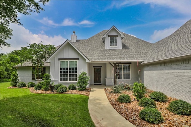 view of front of house with a front lawn