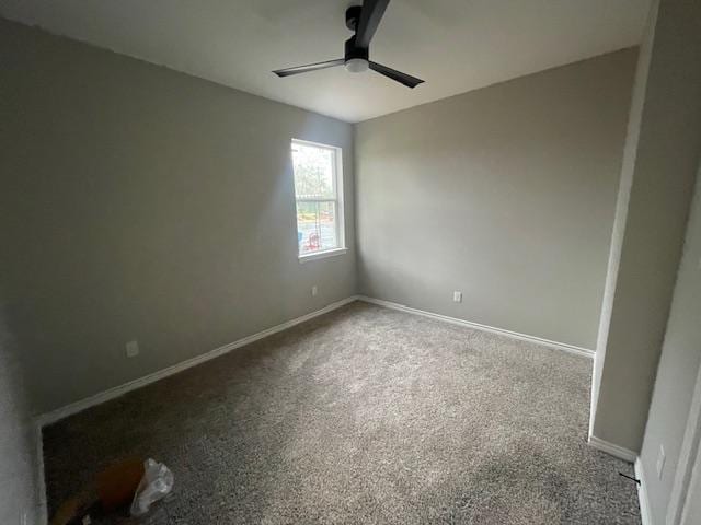 unfurnished room featuring carpet floors and ceiling fan