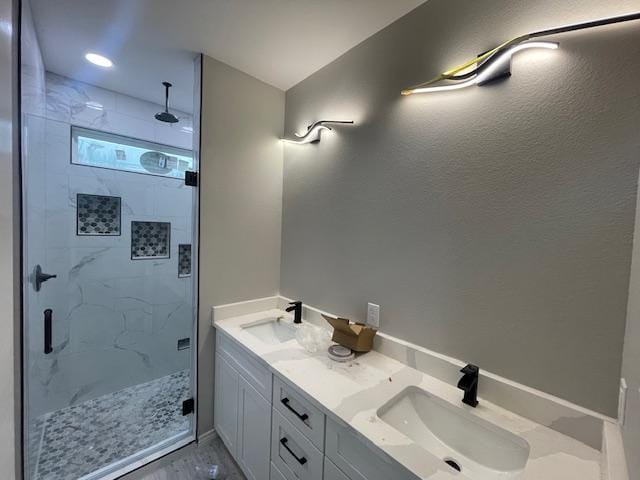 bathroom featuring vanity and walk in shower