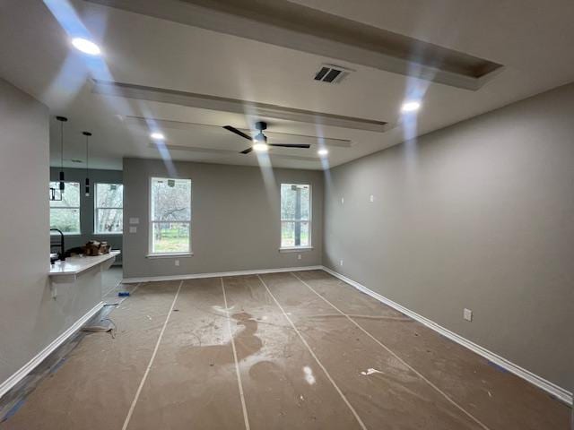 unfurnished room with ceiling fan