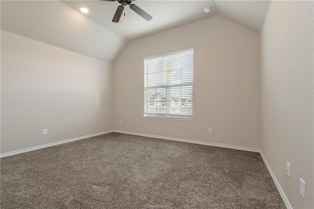 3429 Alsace Ct, Bryan, TX 77808 - carpeted empty room with vaulted ceiling, a ceiling fan, and a smoke detector