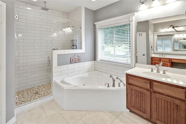 4886 Burt Rd, Bryan, TX 77807 - bathroom featuring a shower stall, a tub with jets, vanity, and tile patterned flooring