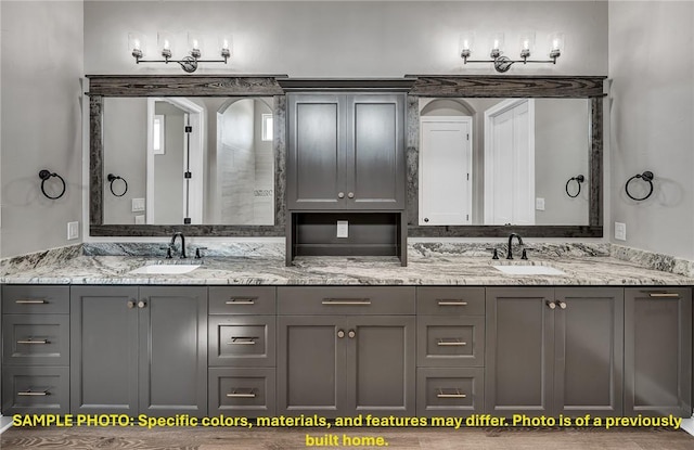 4760 Coral River Rd, College Station, TX 77845 - bathroom with double vanity and a sink