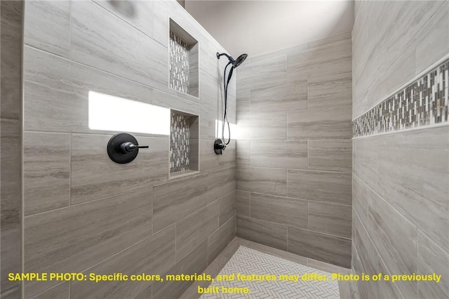 4760 Coral River Rd, College Station, TX 77845 - bathroom featuring a tile shower