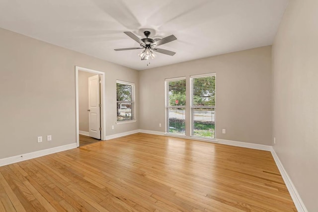 spare room with ceiling fan and light hardwood / wood-style floors