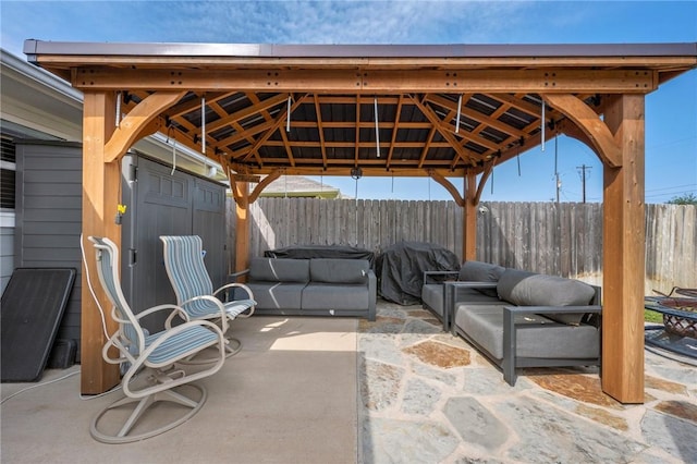 view of patio with a gazebo and outdoor lounge area