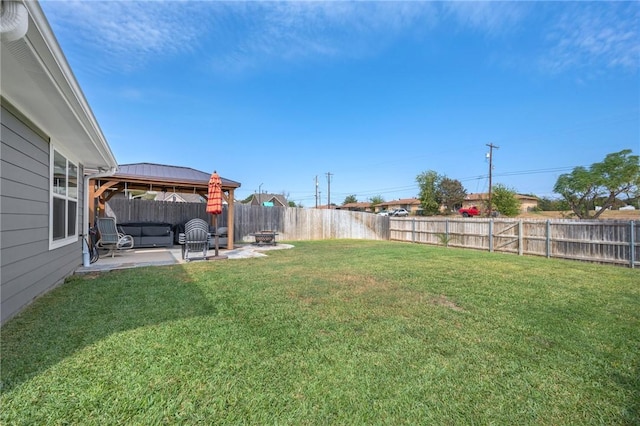 view of yard with a gazebo and a patio