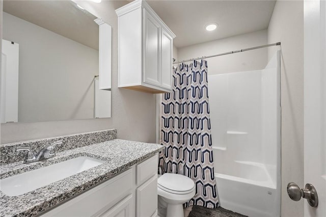 full bathroom featuring vanity, toilet, and shower / bath combo with shower curtain