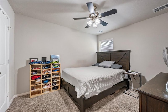 carpeted bedroom featuring ceiling fan