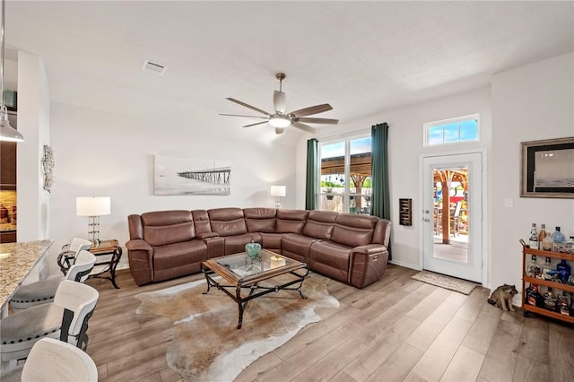 7902 Putter Place Ct, Navasota, TX 77868 - living area featuring light wood-style flooring and a ceiling fan