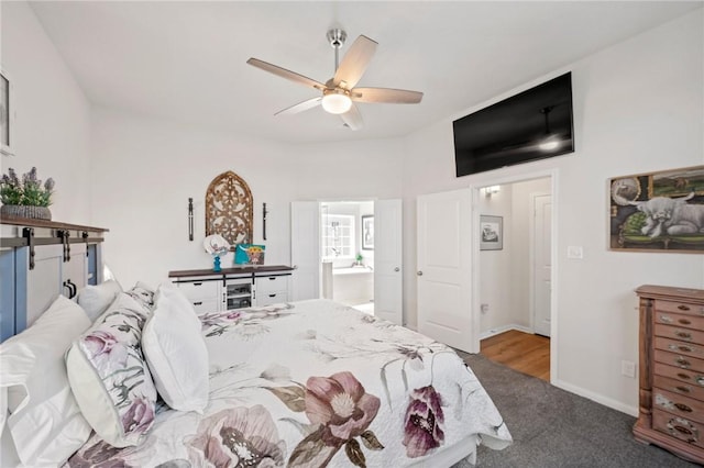 7902 Putter Place Ct, Navasota, TX 77868 - carpeted bedroom with ceiling fan and ensuite bathroom