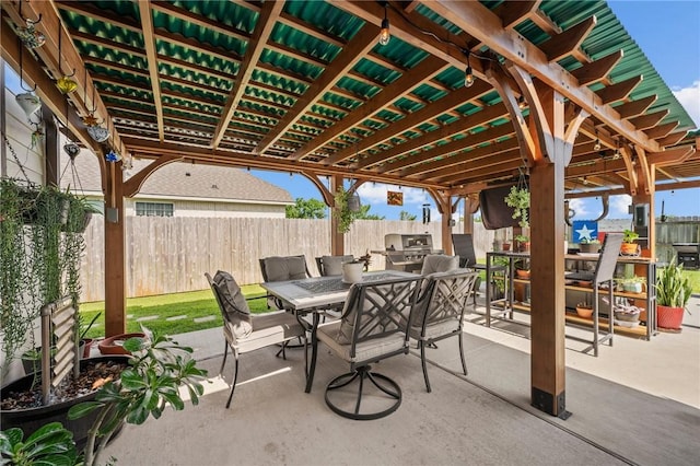7902 Putter Place Ct, Navasota, TX 77868 - view of patio / terrace with area for grilling, outdoor dining area, and a pergola