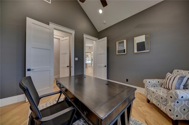 office with lofted ceiling, light wood-type flooring, and ceiling fan